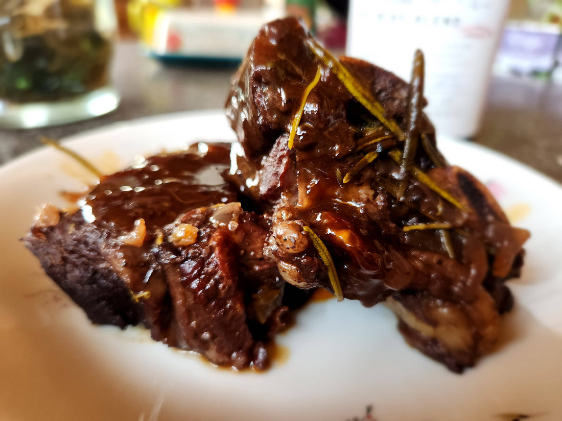Image of garlic braised beef short ribs with red wine sauce